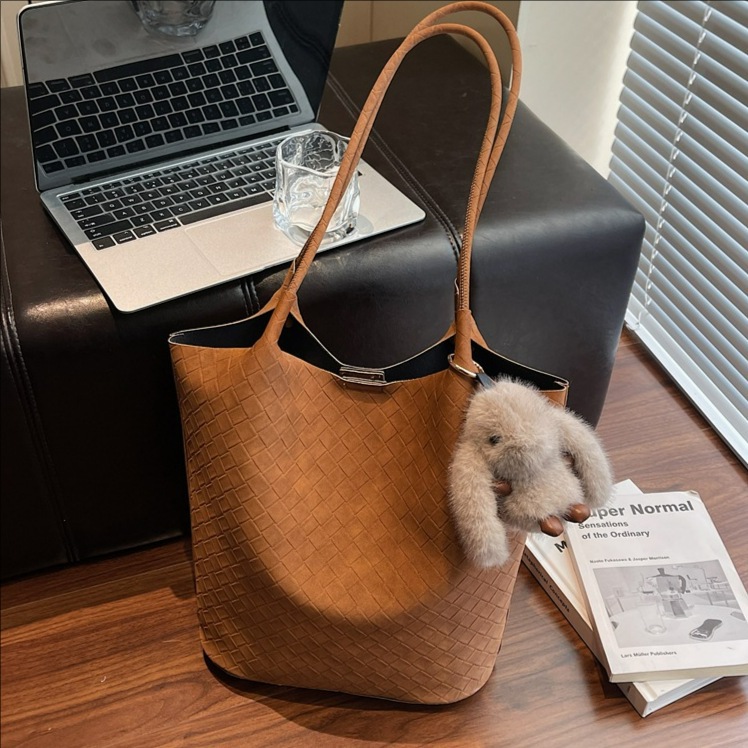 2025 nuevo bolso de mujer coreano retro bolso de cubo de mano nicho bolso de tejido de gran capacidad de viaje de hombro bolso de madre