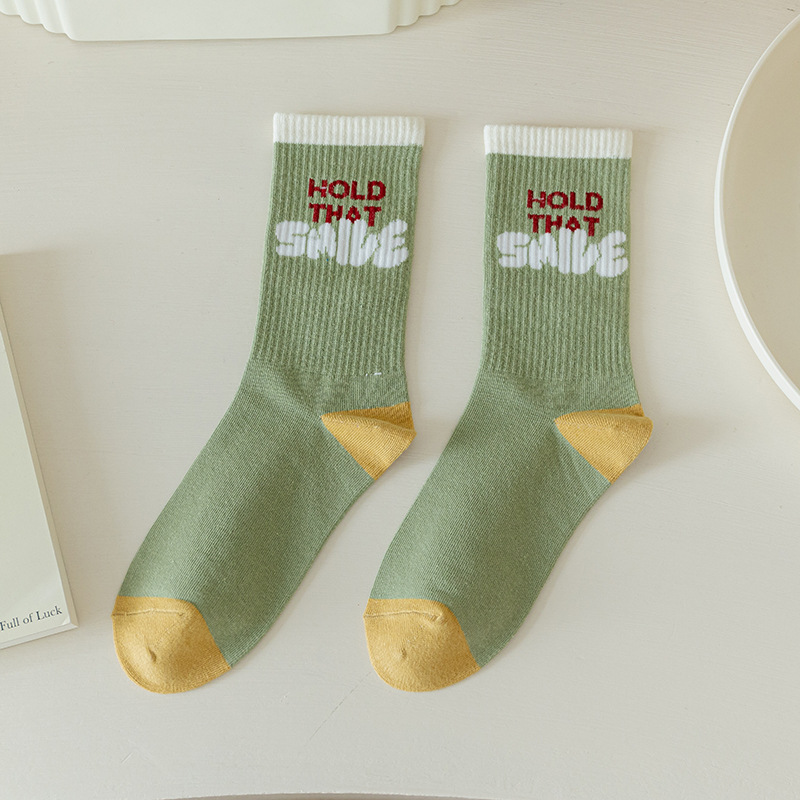Algodón peinado Smiley calcetines deportivos calcetines a juego de colores calcetines de hombre Otoño e Invierno calcetines de marea blanca de algodón de color sólido mediados de la pantorrilla