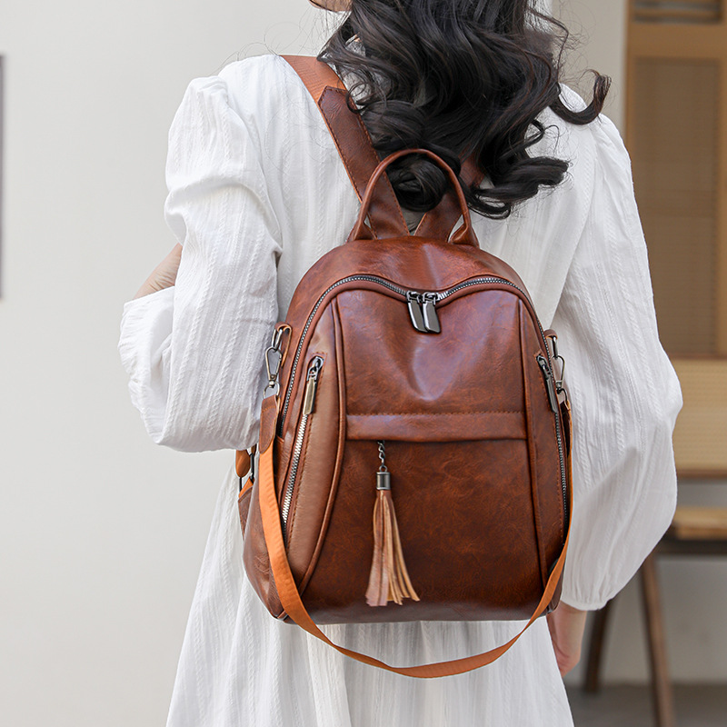 Mochila de mujer al por mayor Mochila de viaje de ocio retro simple transfronteriza multifuncional de gran capacidad bandolera