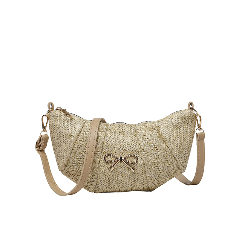 Bolsos tejidos de diseño de nicho para mujer 2025 verano nueva textura comercio exterior casual moda un hombro axila bolsa de bola de masa