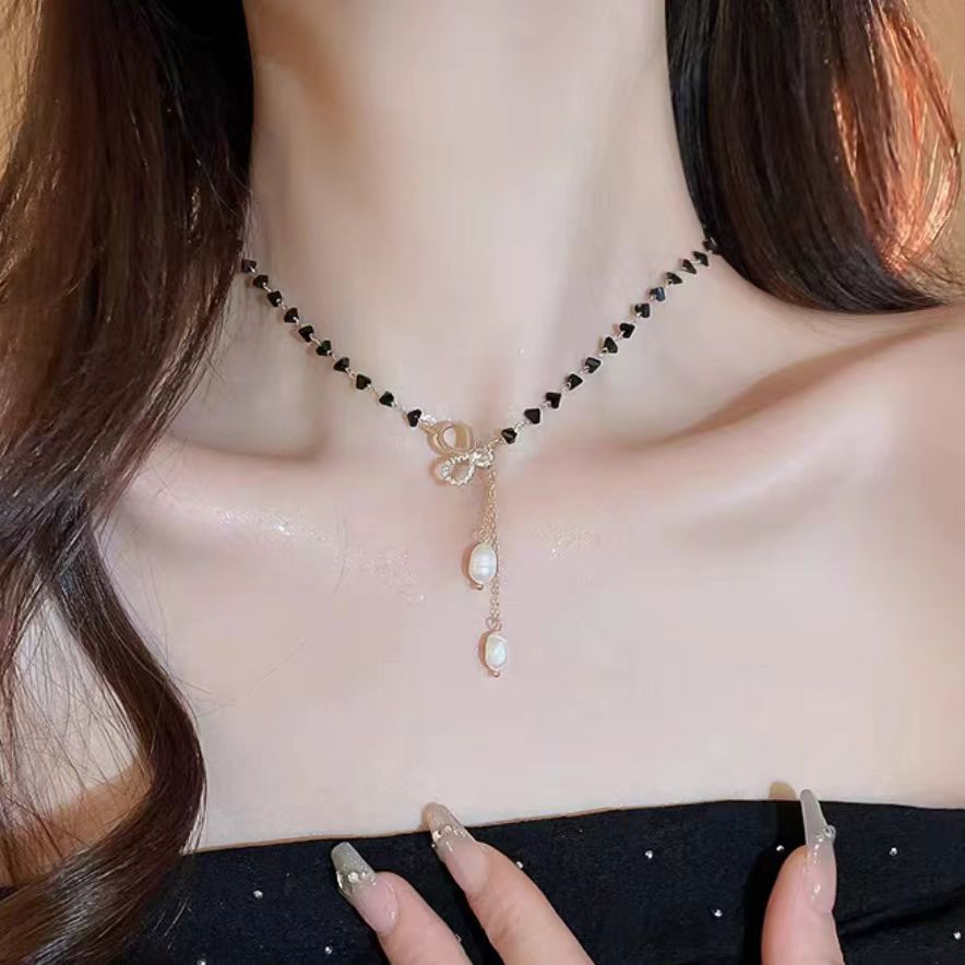 Collier pendentif papillon en perles et zircon micro-pavé, style européen et américain, pour femme. Design de niche, polyvalent et haut de gamme._voghion.com