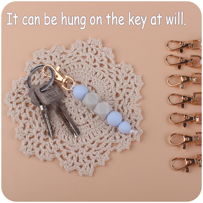 Nuevo DIY creativo llavero de oro colgante mármol octogonal cuentas de silicona llavero colgante bolsa colgante