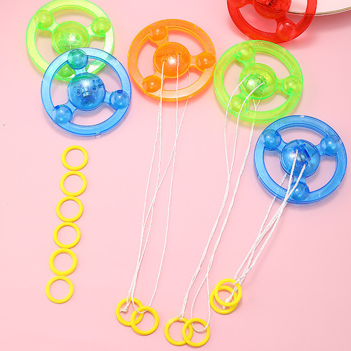 Pull string flywheel Pull string flash flywheel Flash top Luminous flying saucer Fitness children's luminous toys wholesale