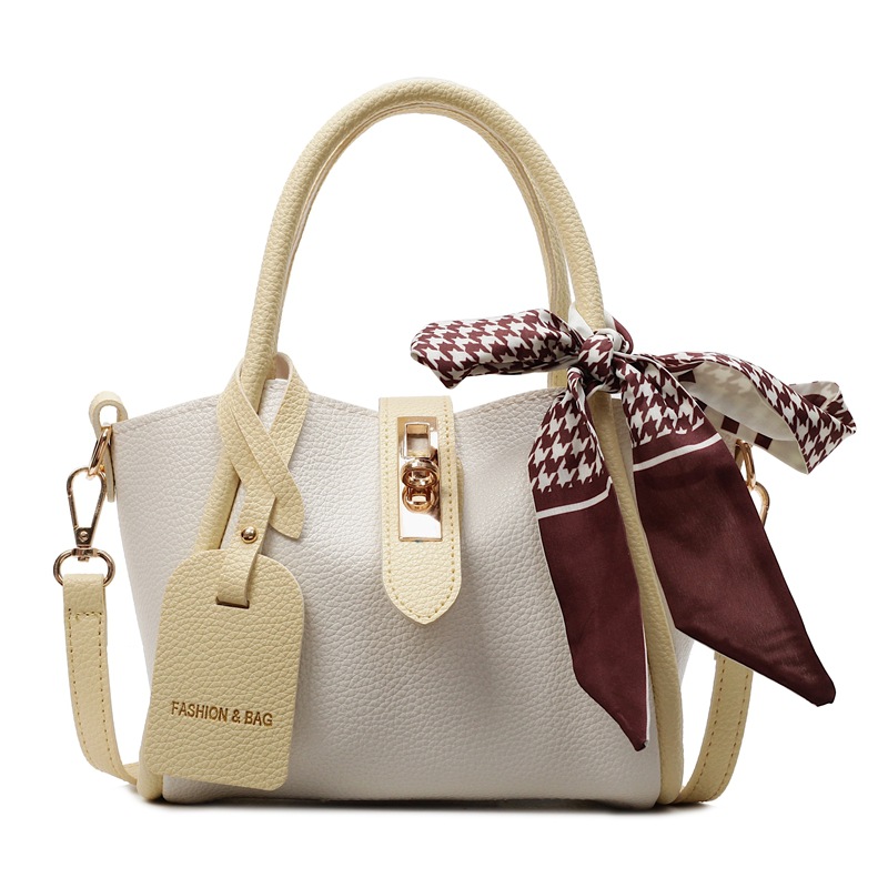 Comercio exterior explosivo bolso de cestas de verduras de mano mujer 2025 nuevo bolso de cinturón simple estilo coreano bolso de cubo de nicho