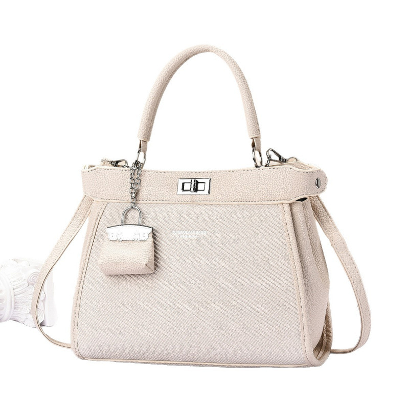 Temperamento bolso de mano 2025 verano nuevo bolso de mochila de viaje ligero bolso de mujer de moda versátil bolsos de hombro