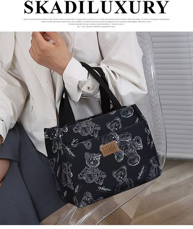 New handbag bento for mommy and office workers. Oxford cloth with rice for work. Fashionable lunch box with large capacity undefined