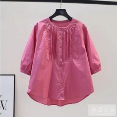 ファッションの白いシャツの女性の夏の新型のデザイン感のしわの丸首の7分の袖のカジュアルな百合のシャツの上着