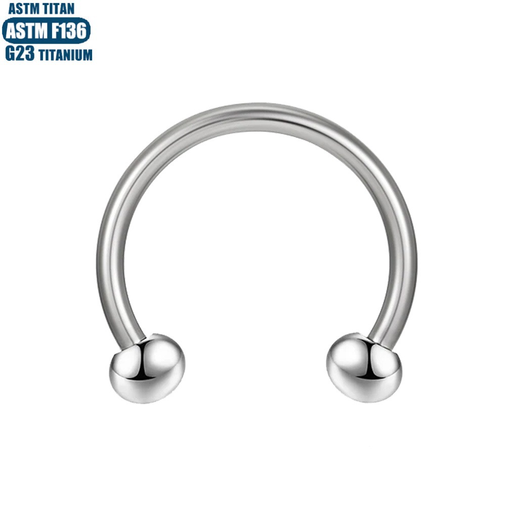 Silver pointed spike labret stud material detail