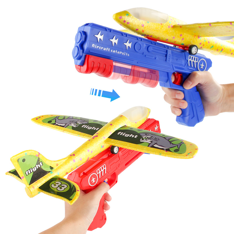 Tiktok Venta caliente espuma luminosa Catapulta Aviones pistola lanzador de mano planeador juguetes para niños al aire libre puesto juguetes del mercado nocturno