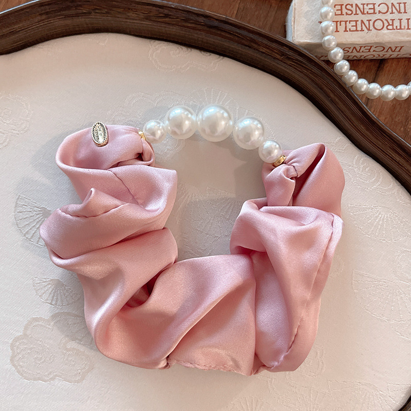 Estilo francés Hepburn perla intestino grueso anillo para el cabello temperamento femenino bola baja cuerda para el cabello retro pequeña fragancia cuerda para el cabello atado
