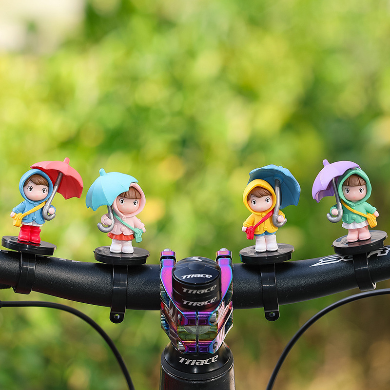 Nueva chica paraguas bicicleta tranvía decoración decoración correa creativa muñeca linda batería decoración de coche