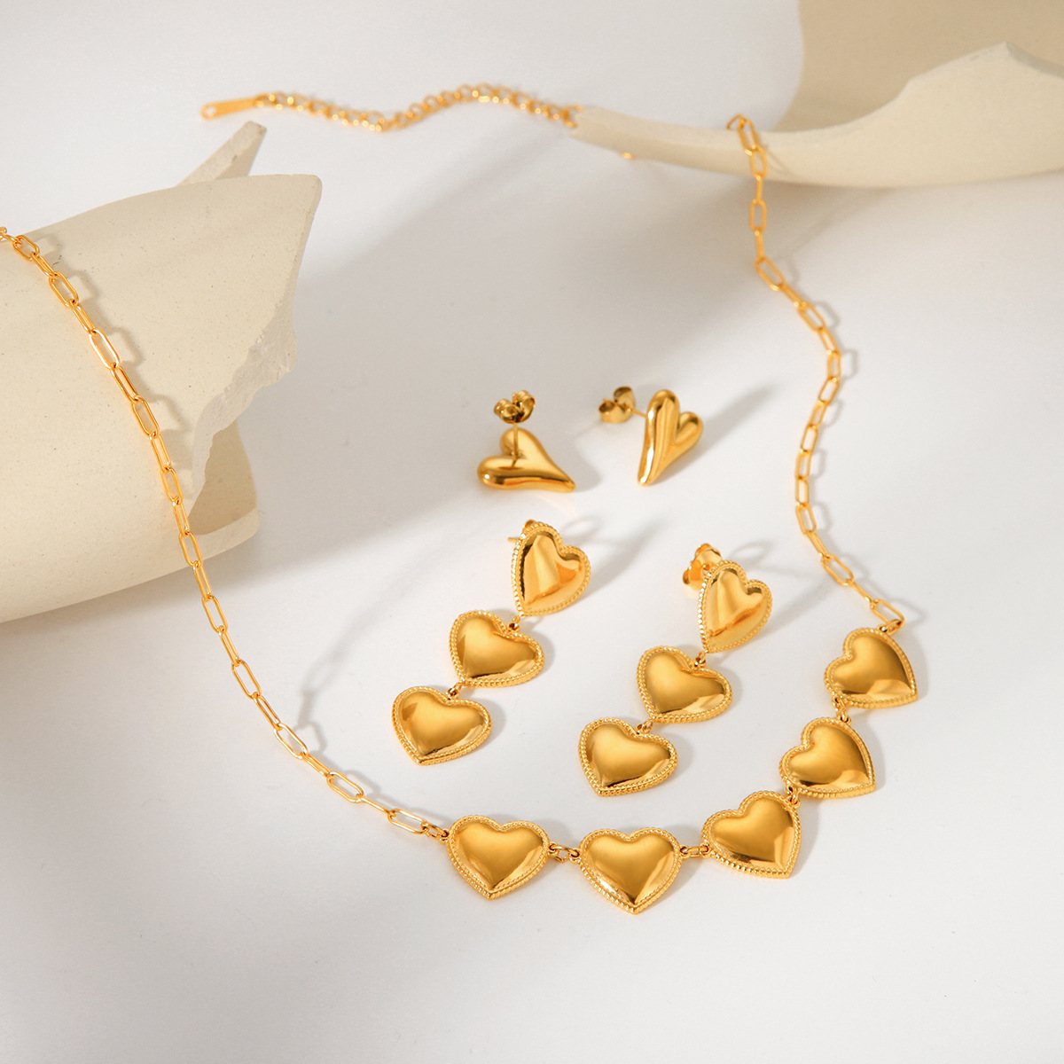 Europa y los Estados Unidos viento red set de joyería de acero de titanio rojo mujer amor collar de acero inoxidable no desvanecer pendientes de elemento de corazón