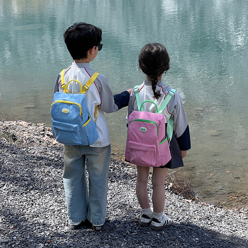 Mochila casual y sencilla para niños y niñas, estilo occidental, lindo color caramelo, mochila escolar para estudiantes de escuela primaria, nueva mochila para niños transfronteriza