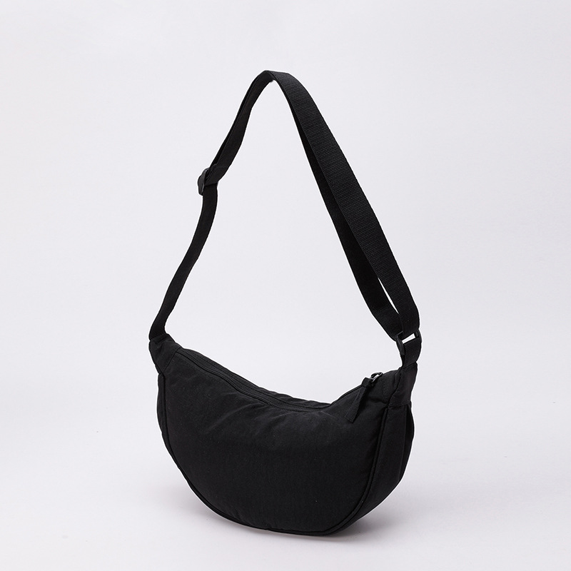 Bolso de tela pequeño bolso de moda ligero bolso de mochila de nylon transfronterizo mujer bolso de hombro casual versátil bolso de bolsas de bolsas de bollo de gran capacidad