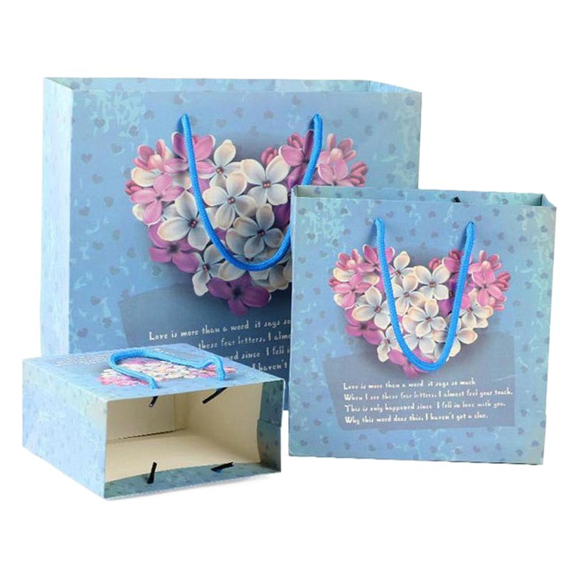 Bolsa de regalo floral bolsa de embalaje de ropa bolsa de papel de regalo de mano bolsa de regalo al por mayor bolso de regalo de ramo