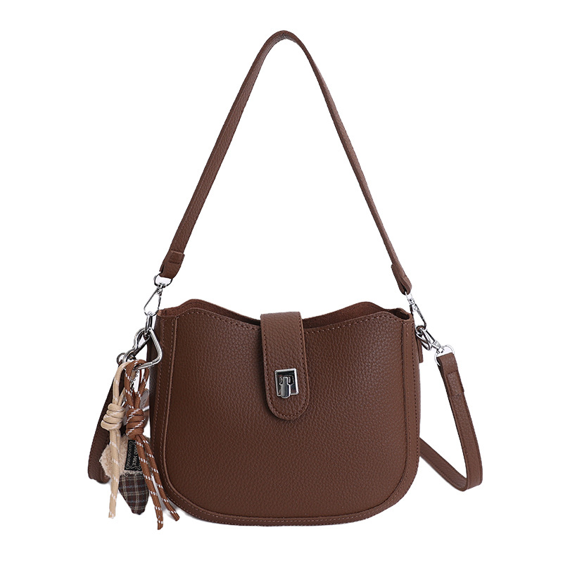 Hot sale nuevo nicho coreano litchi estampado bolso de cubo de hombro para mujeres sensación de lujo ligero versátil bolso de transporte de viaje