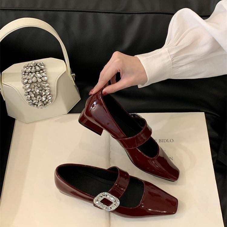 Mary Jane shoes with rhinestones made of patent leather square toe…