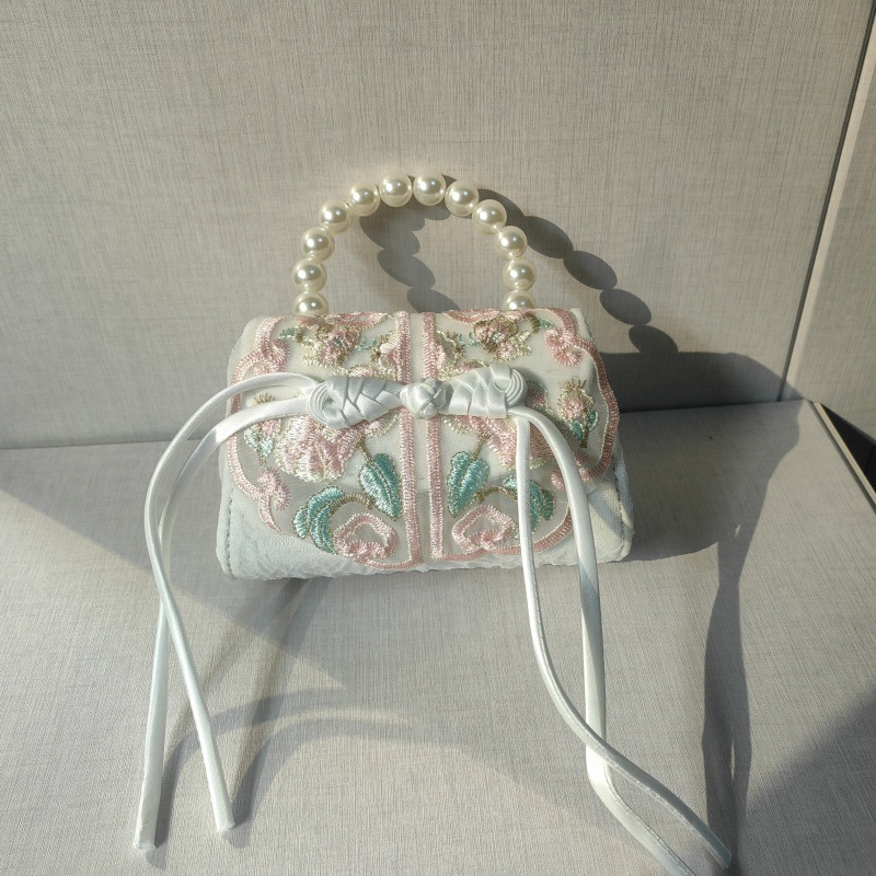 2025 primavera y verano estilo caliente moda casual niños dulces bolsa de gelatina mini bolso de mensajero de un solo hombro variedad al por mayor