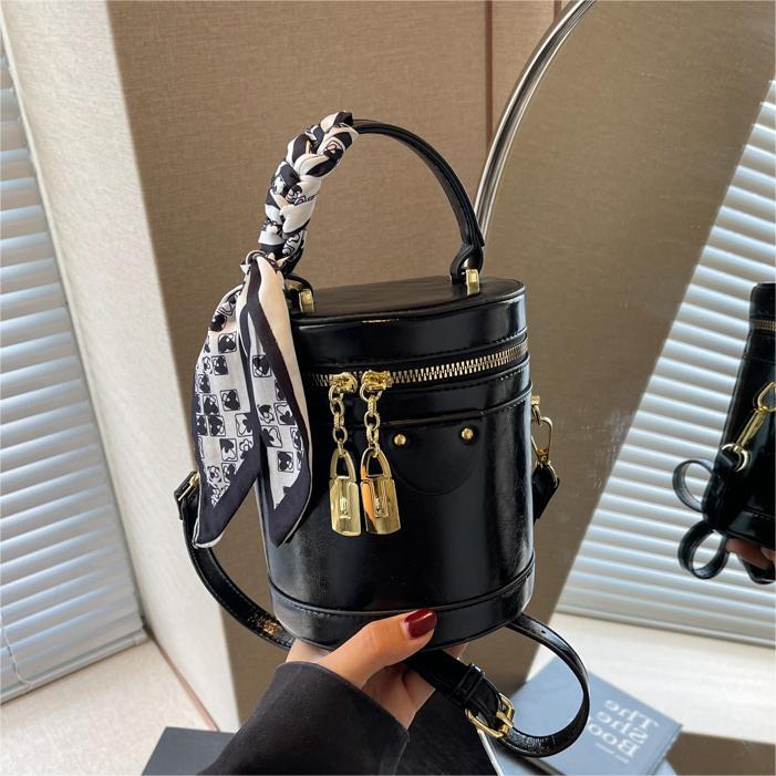 Este año, la popular explosión de bolsas de cubo de mano 2024 nuevo bolso de mujer, nicho de alto nivel, bolso de hombro, bolso de mochila universal