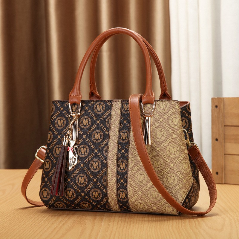 Diseño de patrón alfabético bolso de mano casual de moda mochila diaria bolsas de hombro transfronterizas