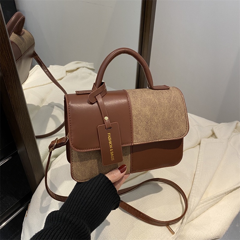 Bolso de mujer otoño / invierno 2024, nuevo estilo coreano de moda, bolso de brazo, bolso de diseño casual de color.