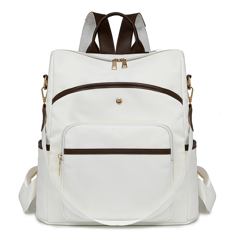 Mochila para mujer Mochila multiusos simple de gran capacidad Color sólido Moda ligera Bolsa de cuero de viaje al por mayor