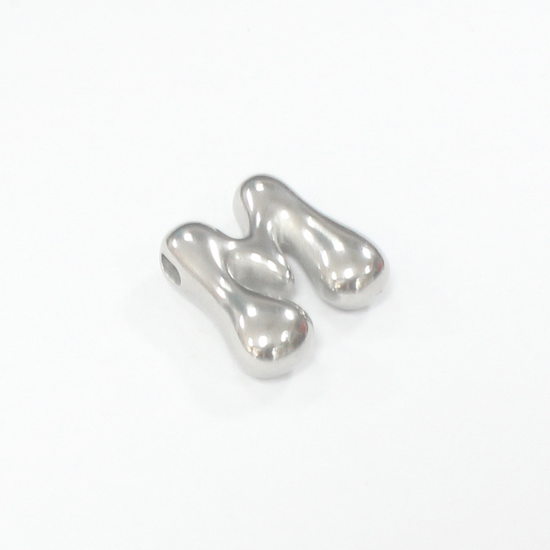 Steel-colored M letter (with horizontal hole on the top) thickness 6.0*width 18*height 18mm*aperture 1.8mm (unit weight 6.16g)