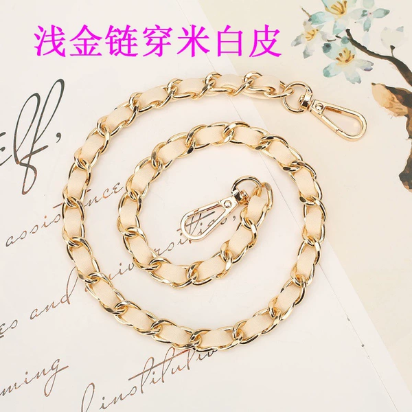 Light gold chains in beige leather
