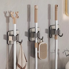 メーカーは浴室の穴を開けない壁掛けモップを提供しています。
