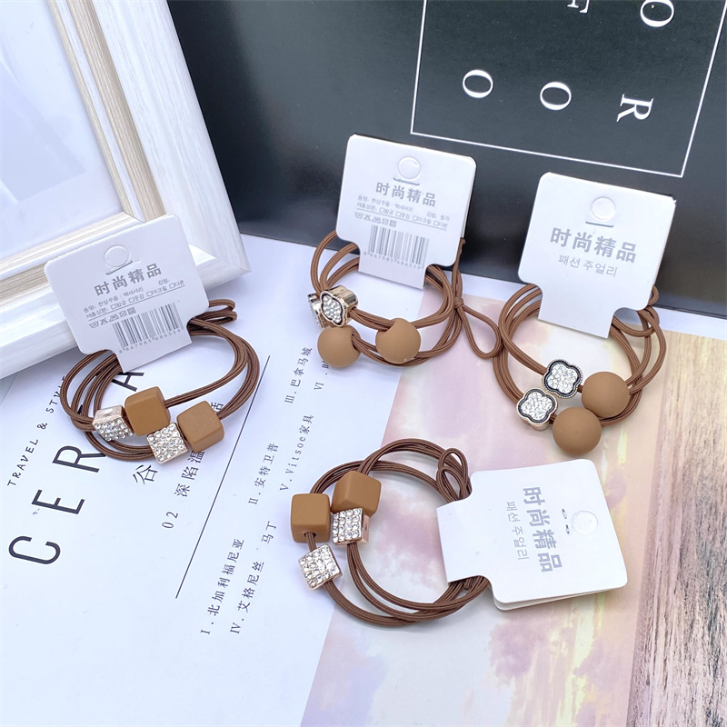 Nuevo estilo coreano etiqueta accesorios para el cabello 2 Tarjeta montada cuerda de pelo simple café leche té cristal cuerda de pelo banda de goma