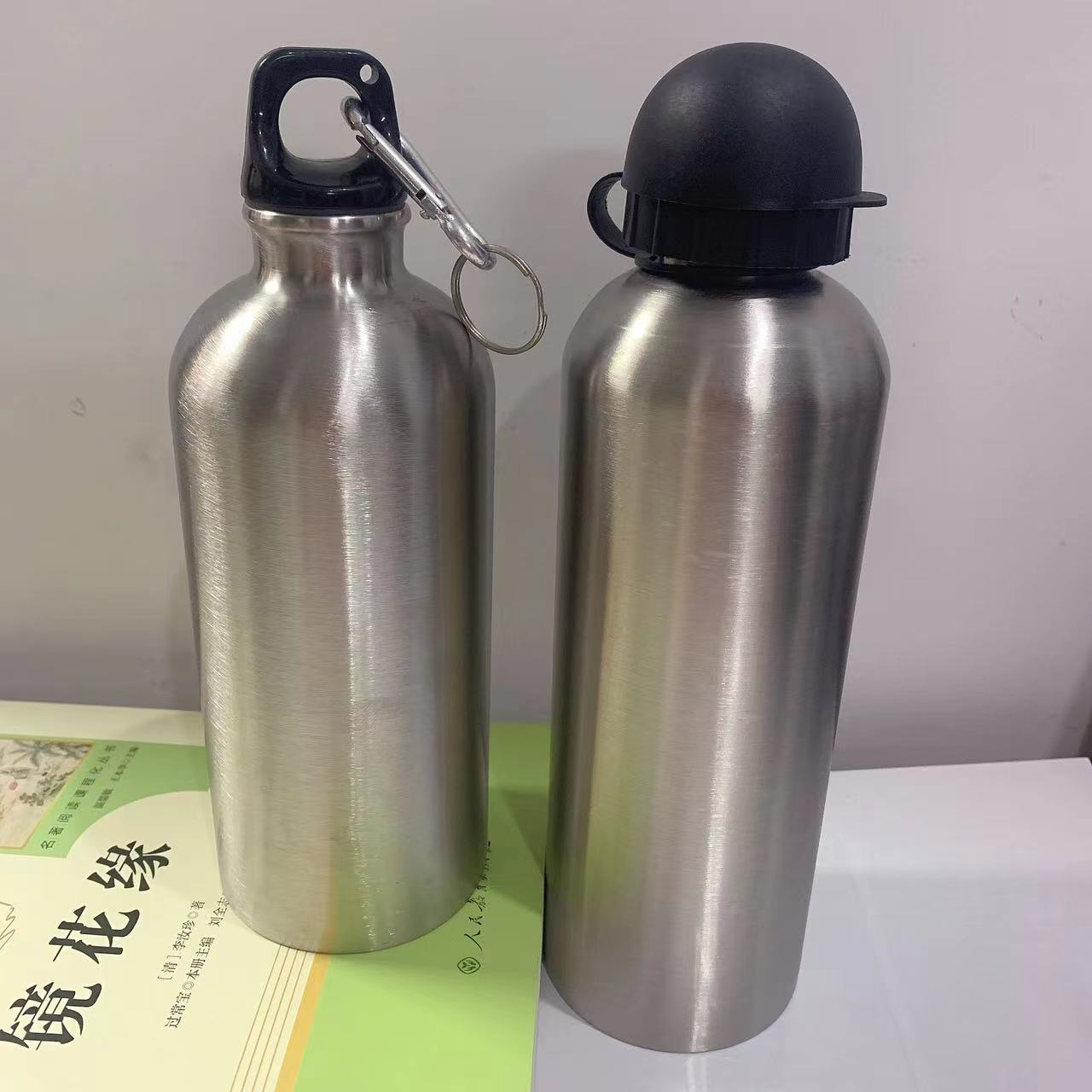 Botella de agua deportiva de boca pequeña de acero inoxidable de una sola capa transfronteriza, ciclismo al aire libre, montañismo, taza de regalo portátil con botella de agua fría con manija