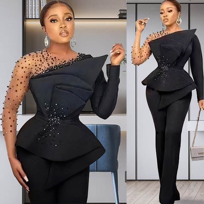 Completo pantalone donna taglie forti con dettagli in mesh e perle_voghion.com