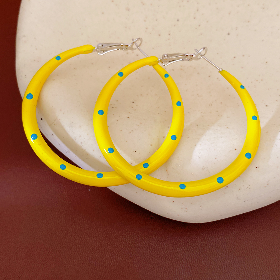 Aguja de plata amarilla goteo de aceite punto de onda aretes redondos simple moda aretes ligeros de lujo alta sensación de aretes al por mayor
