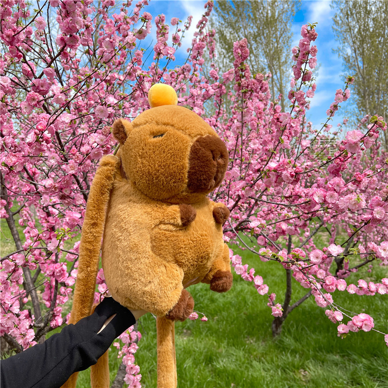 Nueva mochila doble Kapibala con peluche estirado, mochila casual, bolso diagonal, regalo al por mayor