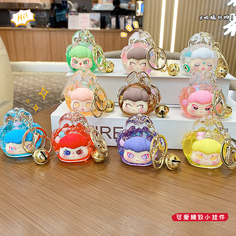 Shake sonido explosivo magos con el mismo astronauta llavero en arena flotante de aceite Durian hermana colgante pequeño regalo al por mayor