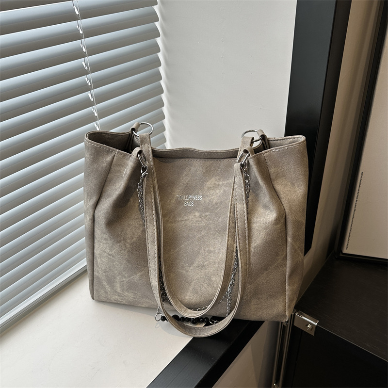 Bolsa de hombro retro de gran capacidad para viajar a la cadena de trabajo para mujeres 2024 primavera y verano nicho bolsas de brazo bolsas de moda