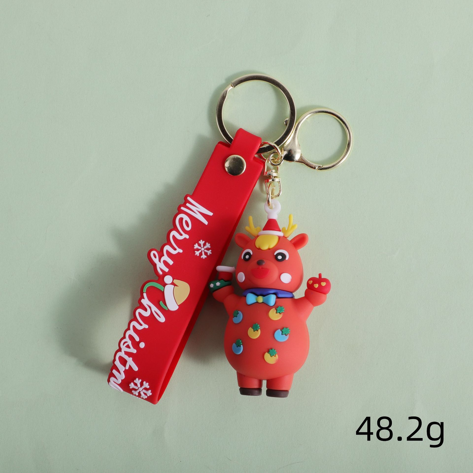 Nuevos productos transfronterizos Santa Claus llavero dibujos animados estilo lindo muñeco de nieve mochila alce colgante coche