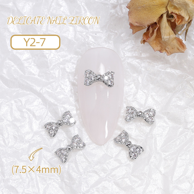 Joyería de circonio para decoración de uñas, lazo para decoración de uñas, aleación de diamantes, perla, joyería de diamantes, accesorios de decoración de libros rojos pequeños, venta al por mayor