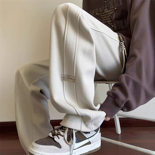 fashion brand casual pants men's loose spring and autumn new style drawstring sweatpants, young students 'high-end pants, trousers