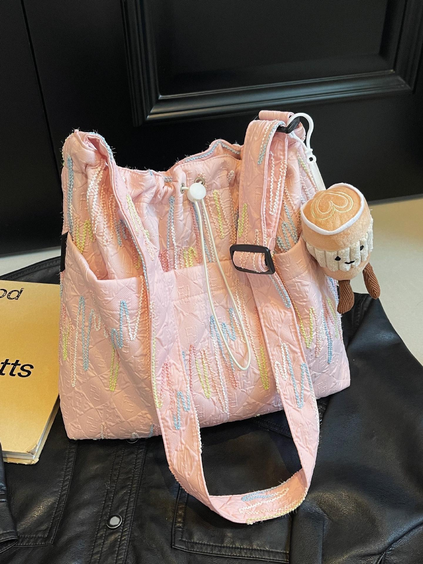 Estilo occidental todo-fósforo bolso de ocio bolso de mensajero mujer 2025 nuevo bolso de cubo de moda simple bolso de lona de viaje para estudiantes