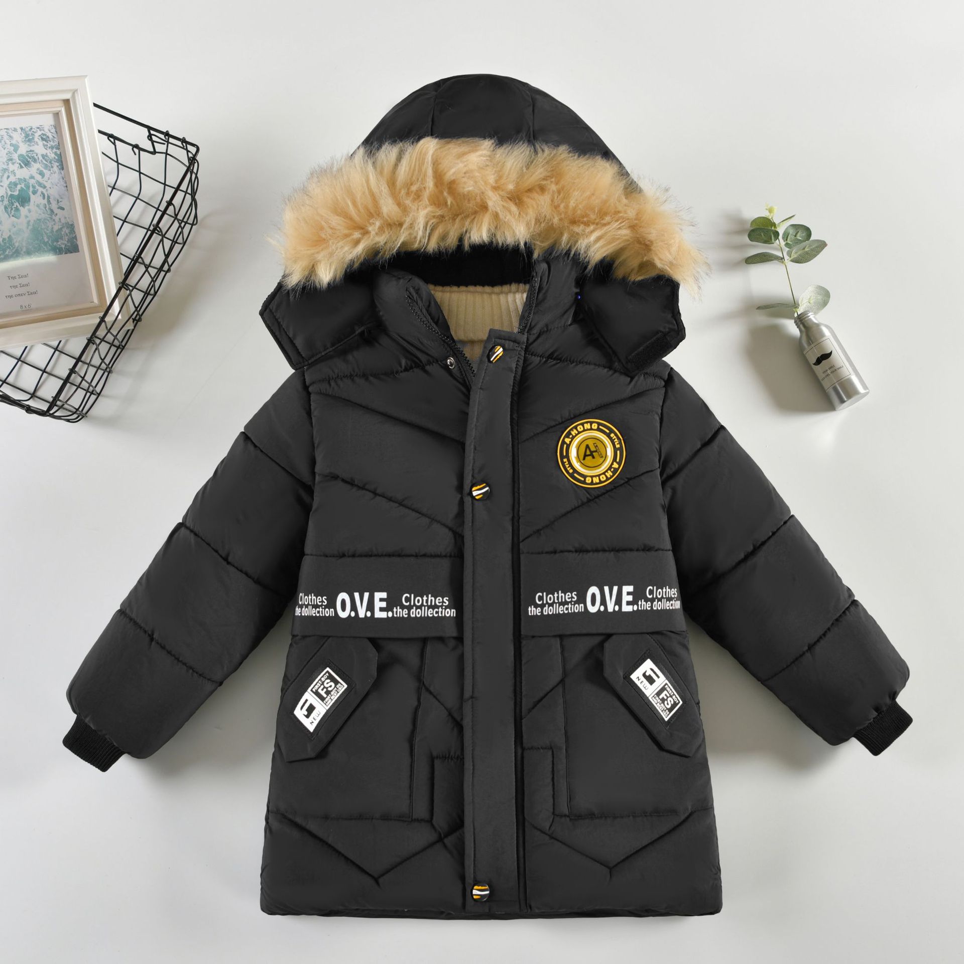 Ropa de invierno para niños engrosada ropa acolchada de algodón de moda abrigo de invierno para niños de longitud media estilo occidental cálido nueva chaqueta acolchada de algodón moda
