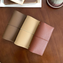 レトロなコーヒー色のA6Slim_15mmのリングのストラップのバインダーの帳簿のレイシの紋様の柔らかい面のpuの携帯のノート