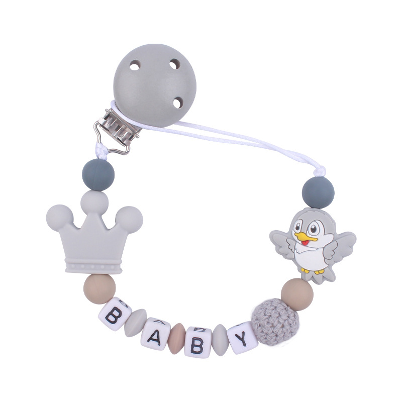 Nuevo bebé suministros de silicona chupete cadena de dibujos animados animal pájaro silicona mordedura pegamento cadena molar cadena anti-gota