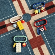 原创多元素小众高级感星星积木苹果钥匙扣个性风包包挂件跨境电商