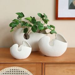 陶磁器の花瓶の創意現代ファッションの白い卵の殻の花は素焼きの家庭の装飾品の置物のメーカーの卸売りを挿します。