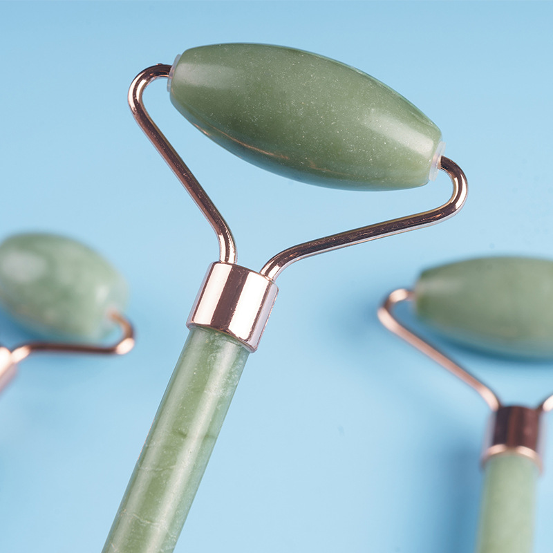 Redondo y cómodo fácil de sostener el rodillo de masaje Xiuyu de doble cabeza suave rodillo de jade facial rodillo de jade contenedor de belleza