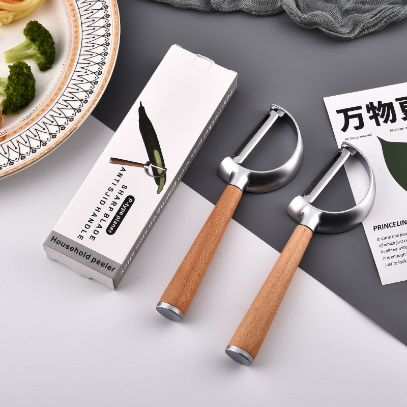 Wooden handle melon planer kitchen gadget fruit peeling knife zinc…