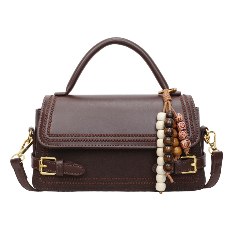 Bolso de mano popular de mujer de alto nivel de moda versátil bolso de hombro pequeño otoño y invierno 2025 nuevo tipo de mochila de viaje