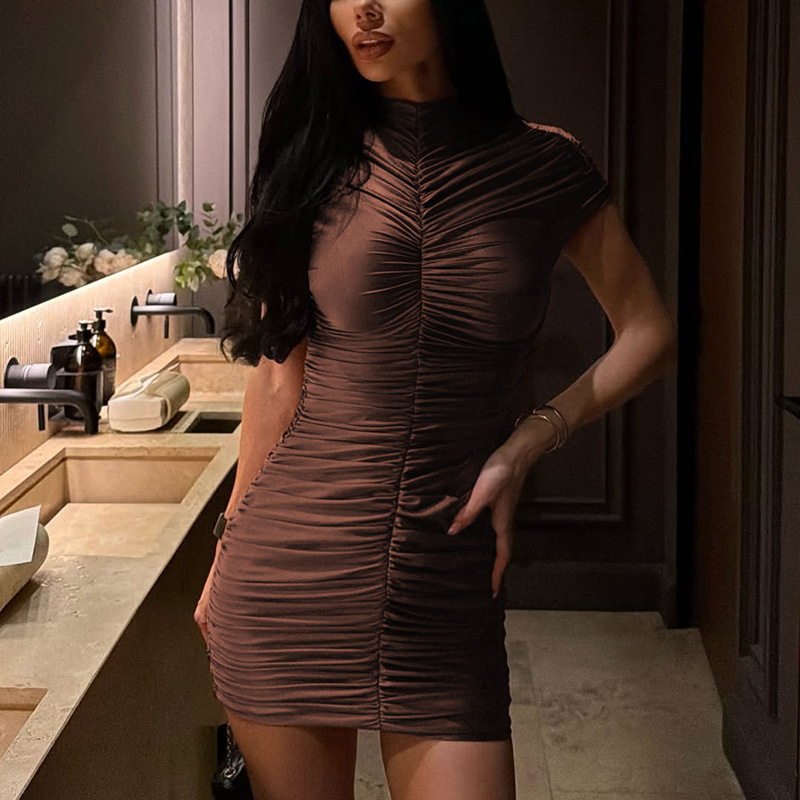 Europa y los Estados Unidos de comercio exterior ropa de mujer 2026 otoño nuevo estilo casual de manga corta de color sólido cuello redondo pliegue delgado bolsa de cadera vestido corto