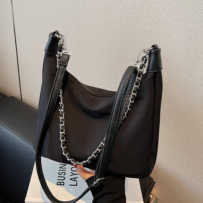 Bolso de axila simple de comercio exterior femenino 2025 nueva versión coreana de la bolsa de mensajero de viaje de trabajo bolso de alta capacidad de ocio